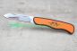 Preview: Blaser Klappmesser Orange mit geöffneter 440C-Stahlklinge und Liner-Lock-Arretierung.
